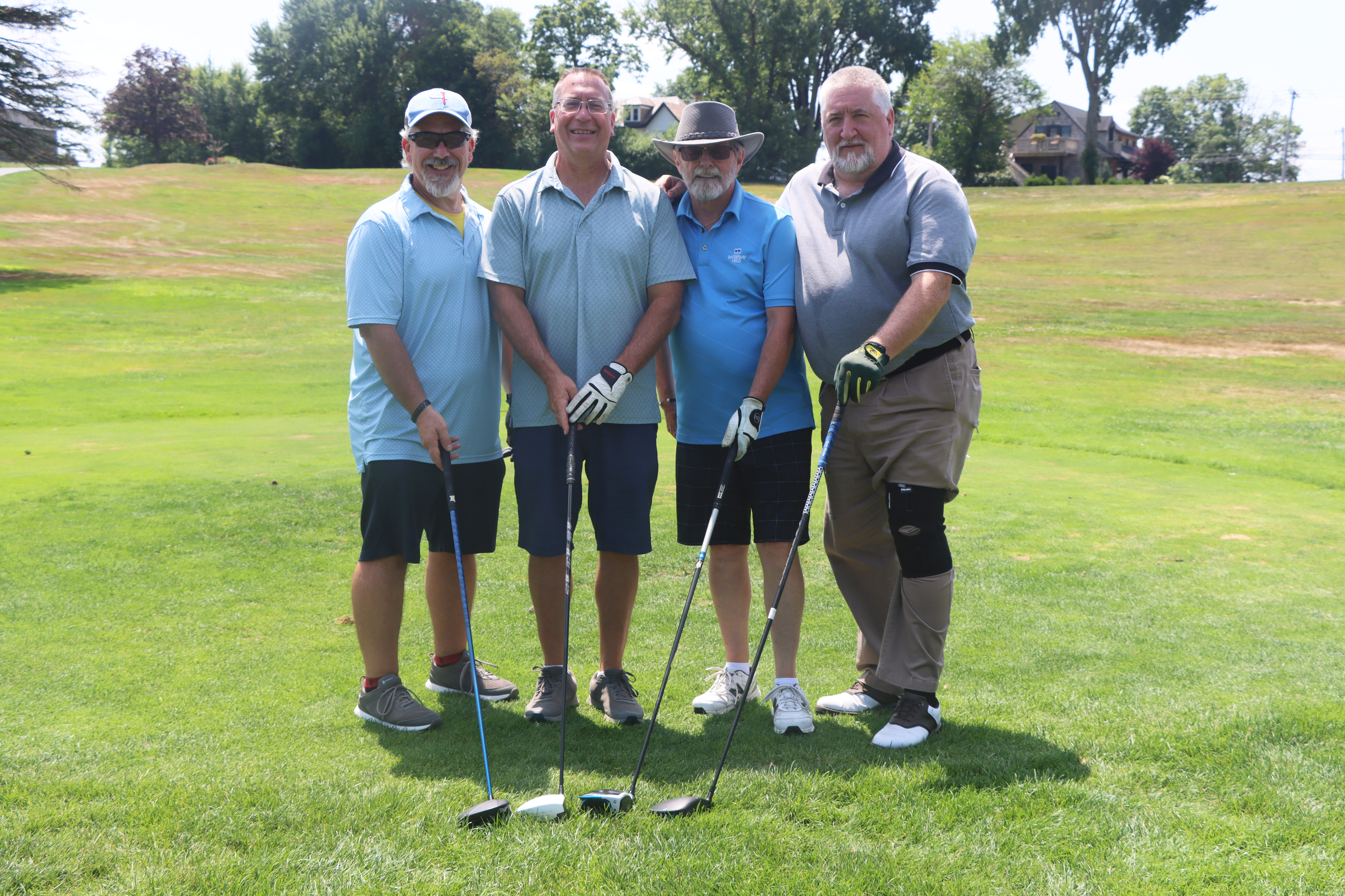 A group of golfers.