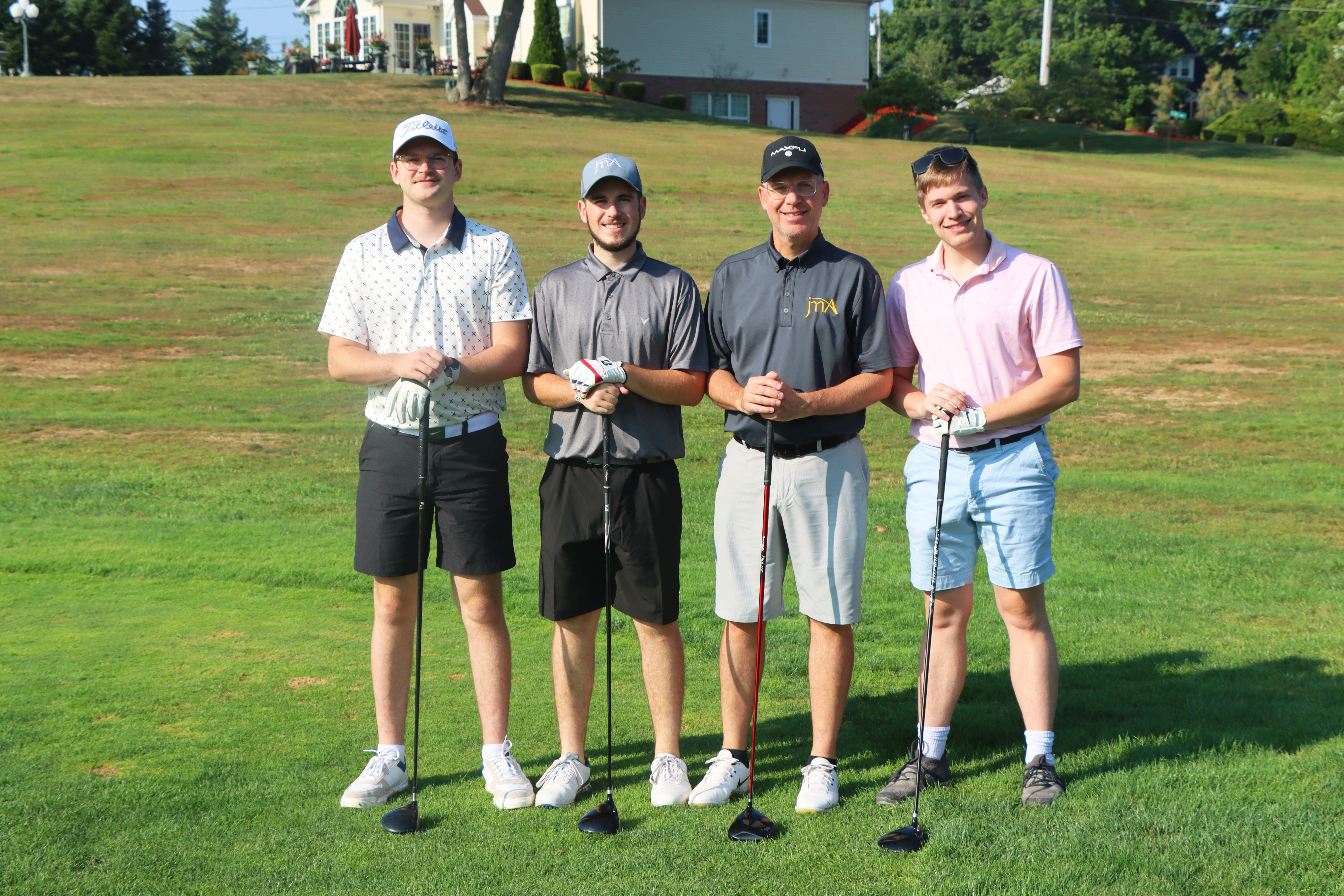 A group of golfers.