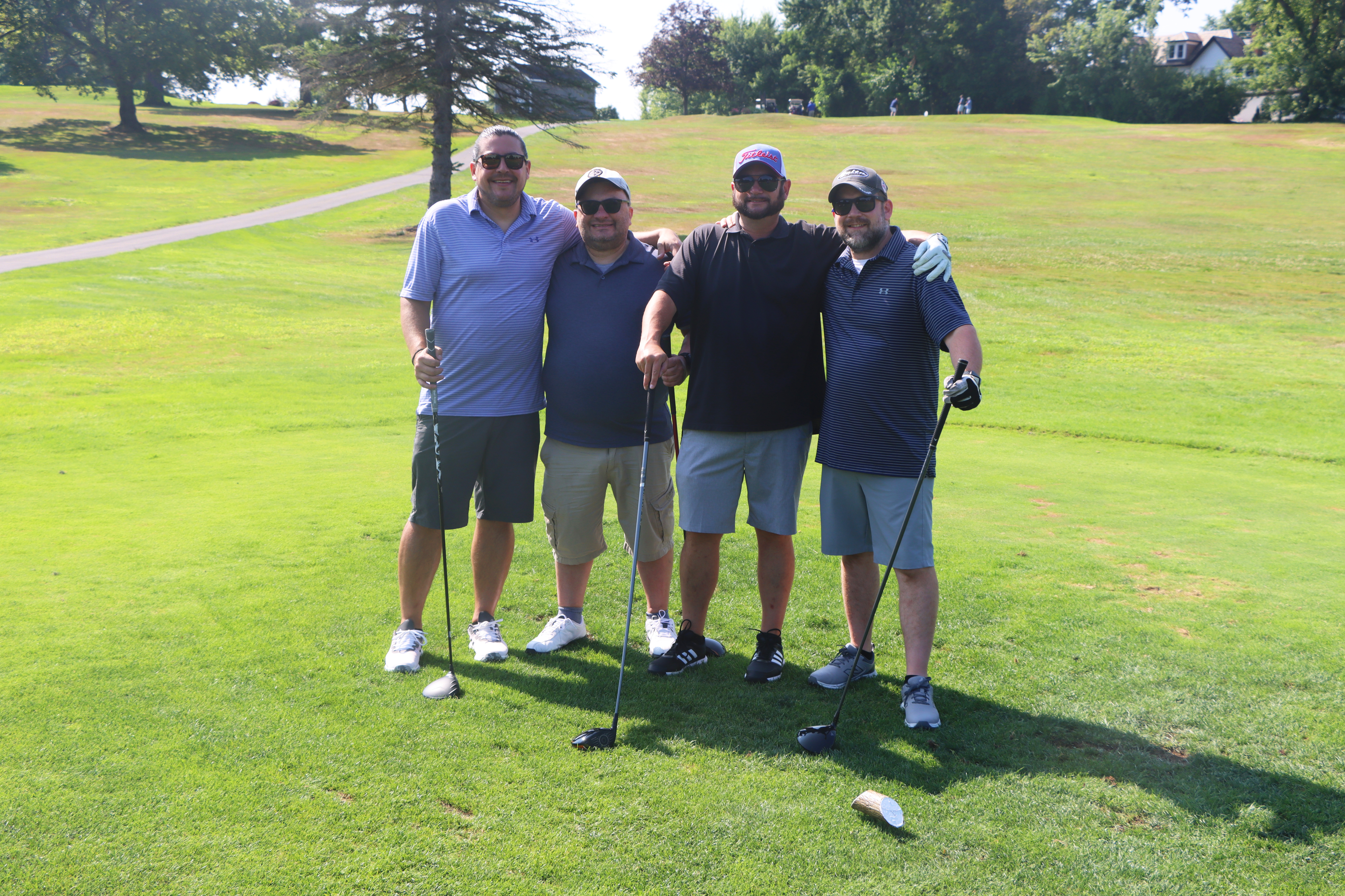 A group of golfers.