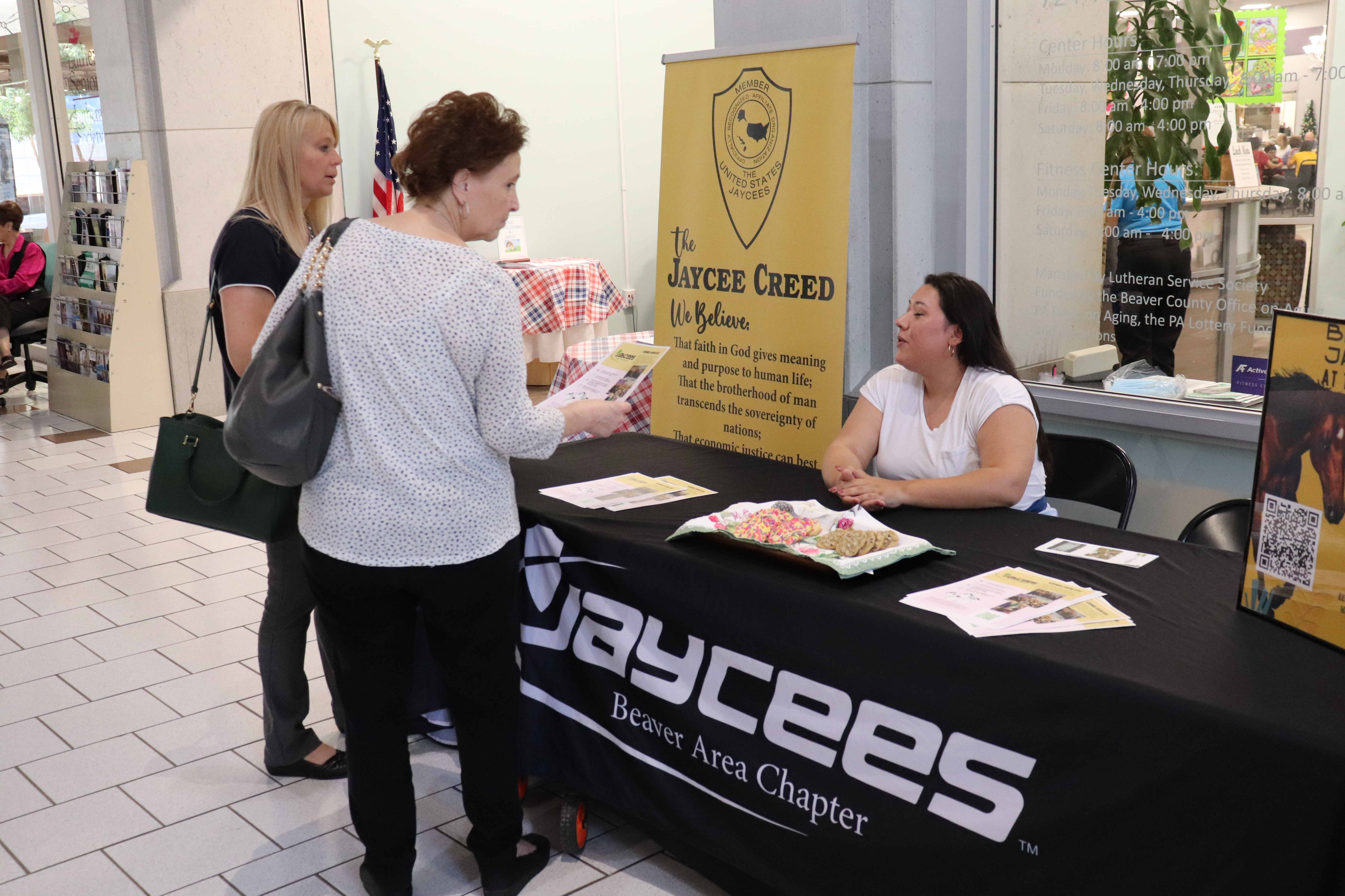 A person visiting the Jaycees' Table
